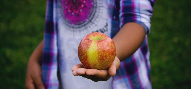 Child with apple.